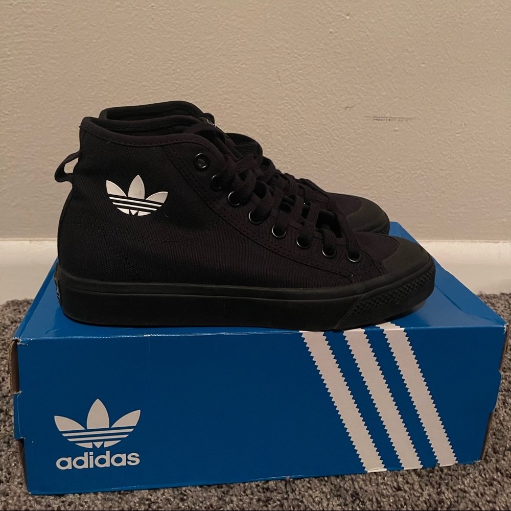 All black high top Adidas